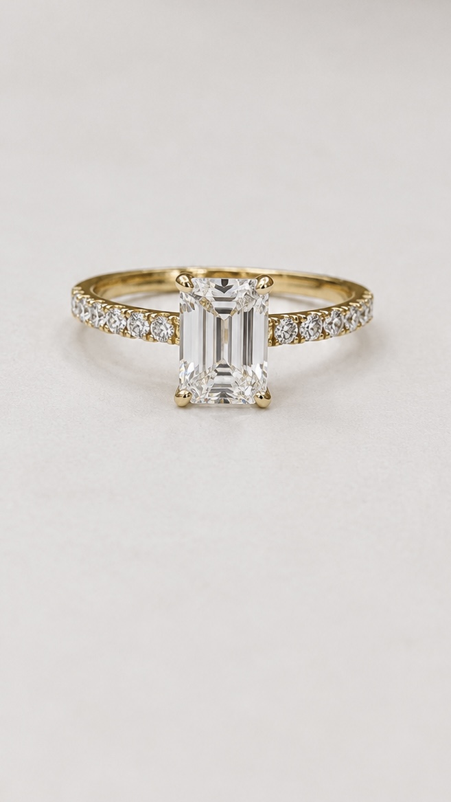 Emerald with side Diamond Ring
