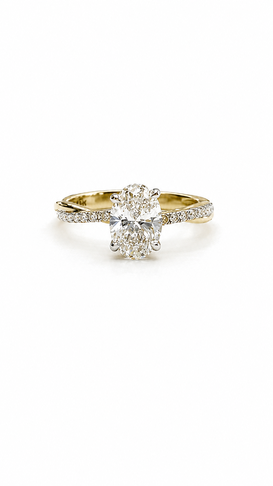 https://akirajewellery.com/product/Oval%20with%20side%20Diamond%20Ring