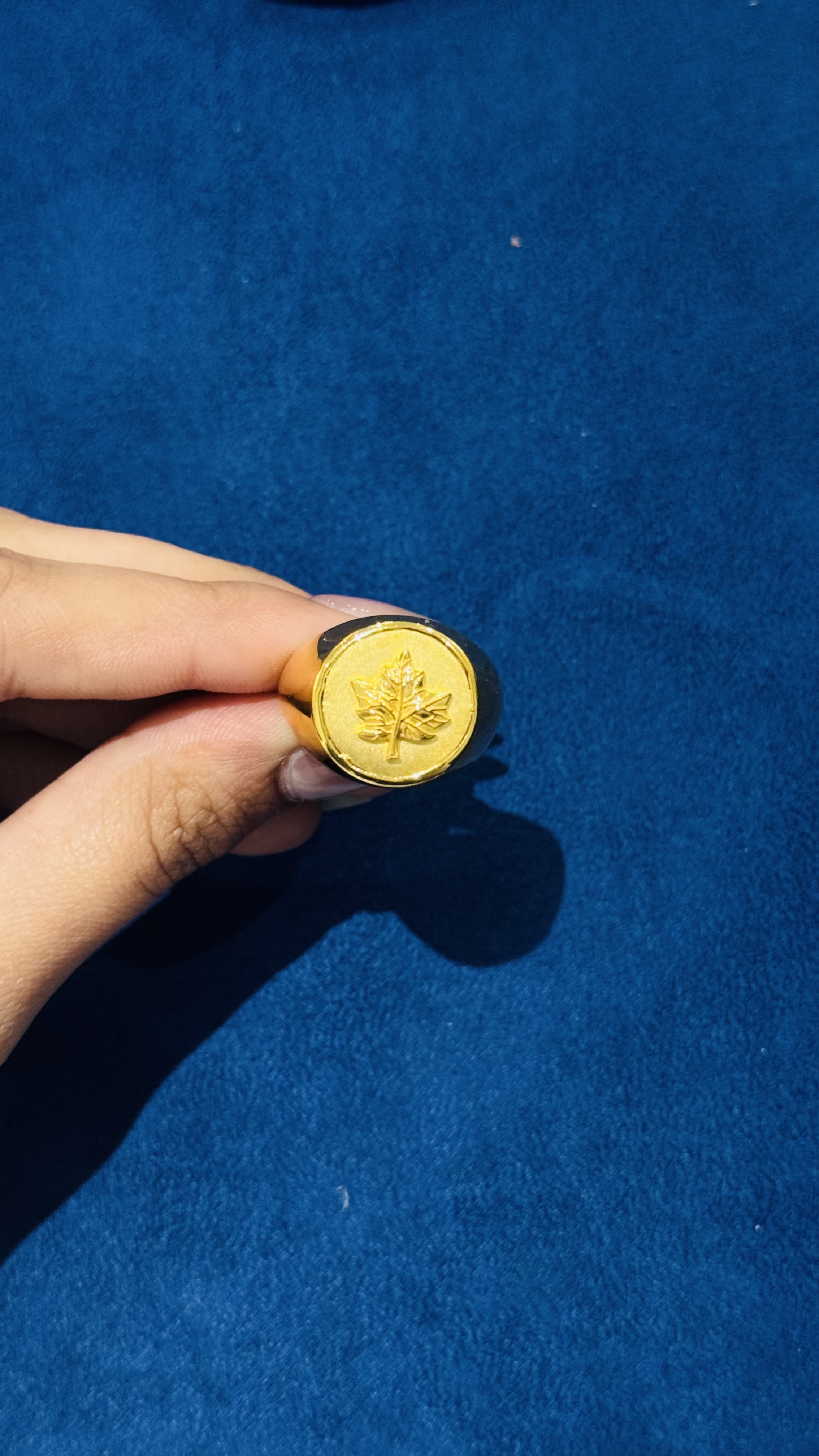 https://akirajewellery.com/product/MAPLE%20LEAF%20MENS%20RING